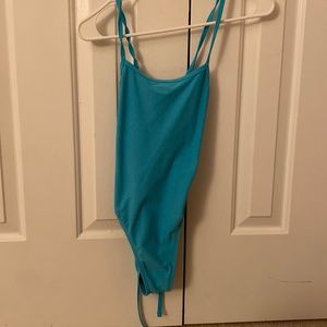 Light blue size 28 joyln one piece. Great condition. Tie back training suit